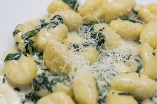 Gnocchi with spinach and parmesan in a cream sauce